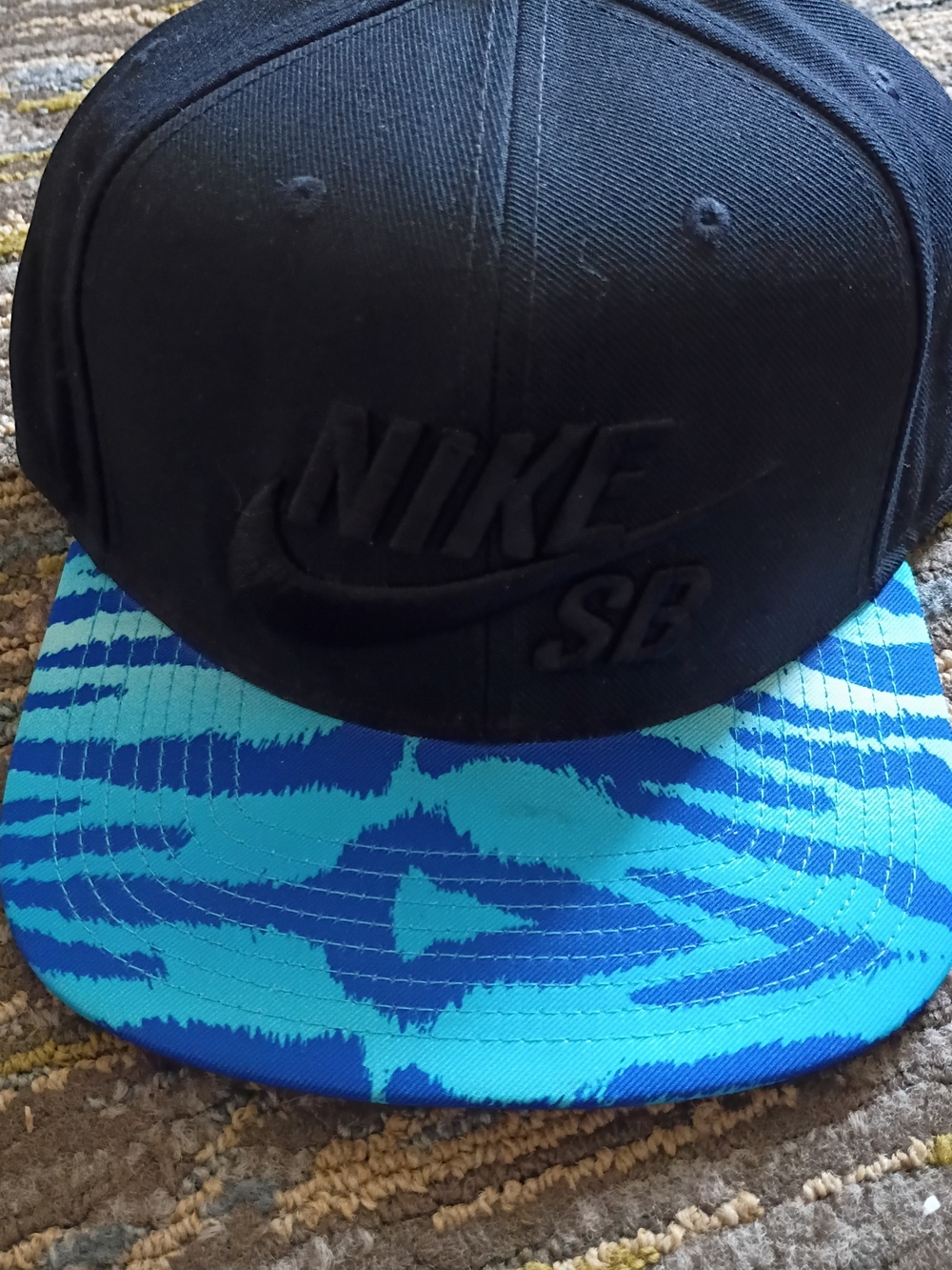 Nike SB Black Snapback with Blue Patterned Brim